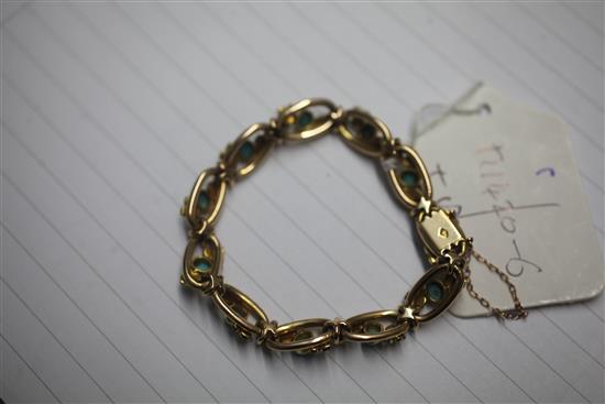 A late Victorian 15ct gold, seed pearl and turquoise set oval link bracelet, approx. 6.5in.